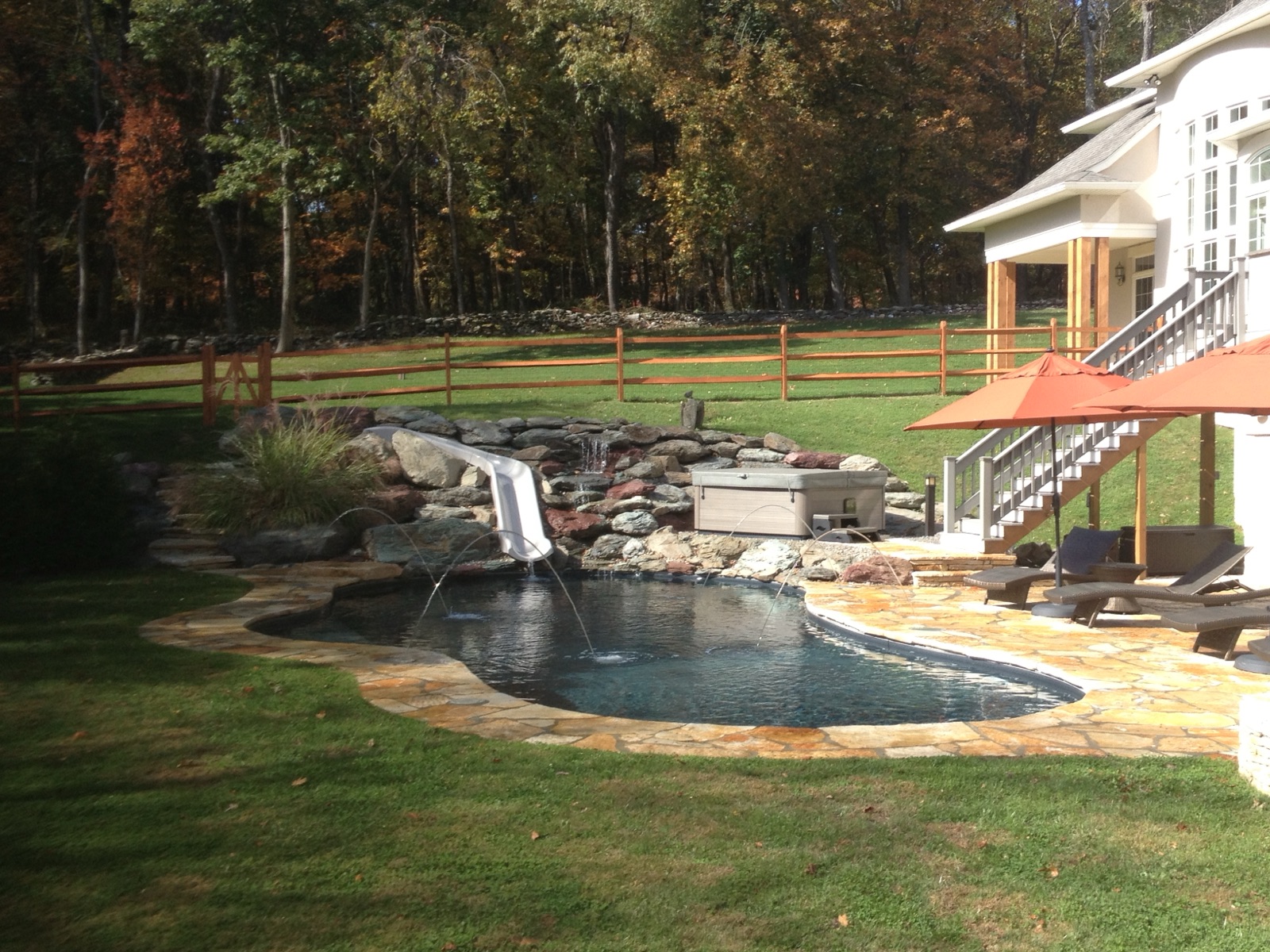 A family-friendly inground pool in a Hudson Valley backyard